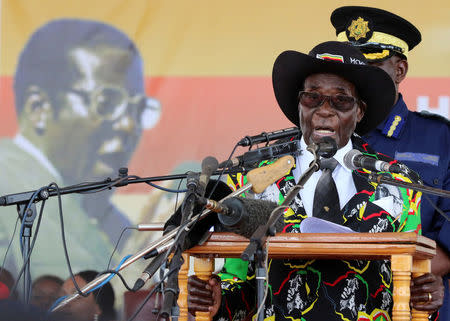 President Robert Mugabe speaks to supporters gathered to celebrate his 93rd birthday at Matopas near Bulawayo, Zimbabwe, February 25, 2017. REUTERS/Philimon Bulawayo