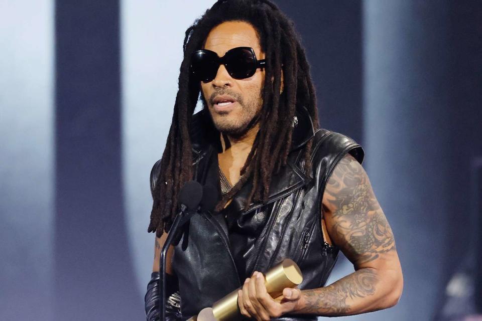 <p>Trae Patton/NBC via Getty</p> Lenny Kravitz accepts the People