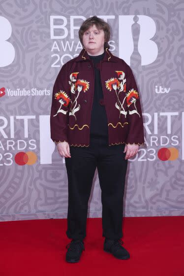 Lewis Capaldi poses for photographers upon arrival at the Brit Awards 2023 in London, Saturday, Feb. 11, 2023.