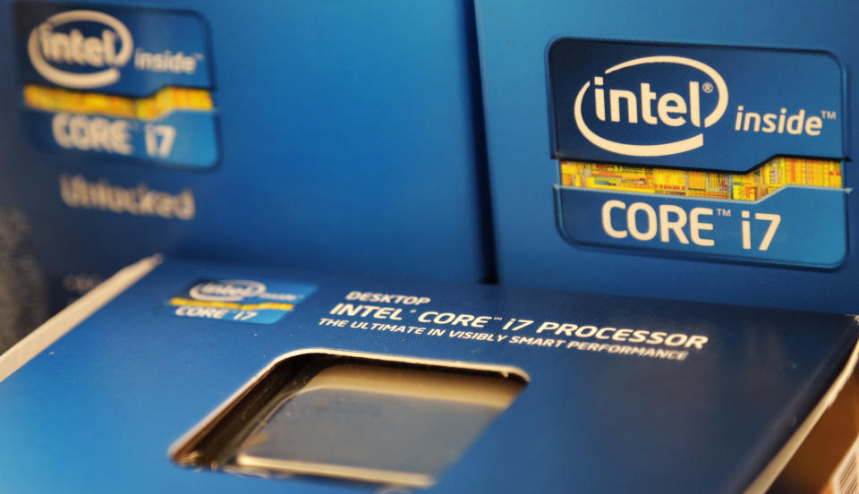 In this Thursday, July 12, 2012, photo, Intel Core i7 processors are stacked at a store in Cambridge, Mass. Intel, the world's largest chipmaker, said Tuesday, July 17, 2012, the weak global economy is slowing its growth as its earnings fell 4.3 per cent in the latest quarter as operating expenses rose faster than revenue. (AP Photo/Charles Krupa)