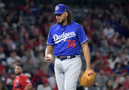 Mar 24, 2019; Anaheim, CA, USA; Los Angeles Dodgers reliever Kenley Jansen (74) reacts in between pitches during the eighth inning against the Los Angeles Angels at Angel Stadium of Anaheim. Mandatory Credit: Kirby Lee-USA TODAY Sports