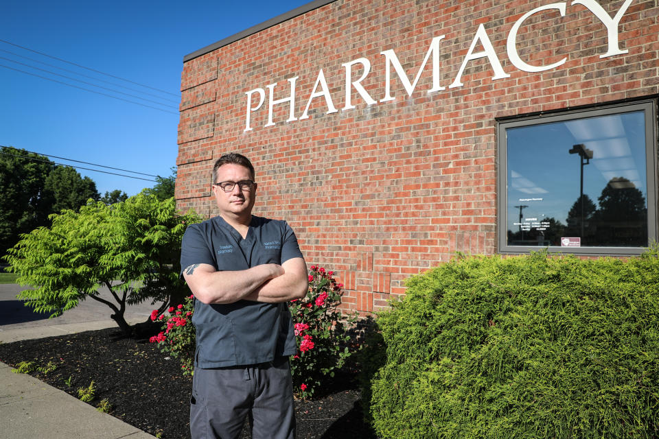 Nate Hux owns two pharmacies next door to each other. One, Pickerington Pharmacy, takes almost every kind of insurance. The other, Freedom Pharmacy, takes none. (Kenzi Abou-Sabe / NBC News)