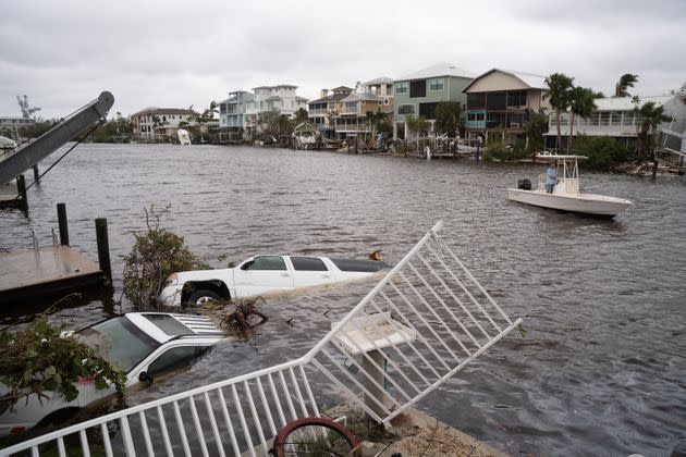 Vehicles float in the water on Sept. 29 after Hurricane Ian passed through Bonita Springs, Florida. (Photo: Sean Rayford via Getty Images)