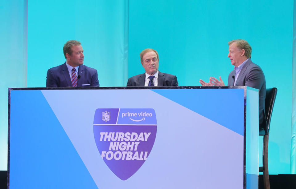 Analyst Kirk Herbstreit, sportscaster Al Michaels, and NFL Commissioner Roger Goodell at Amazon’s Thursday Night Football presentation at IAB NewFronts in May. - Credit: Photo by Michael Loccisano/Getty Images for Amazon