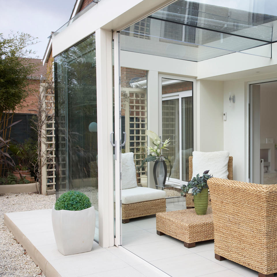 Modern conservatory with indoor-outdoor floor iles