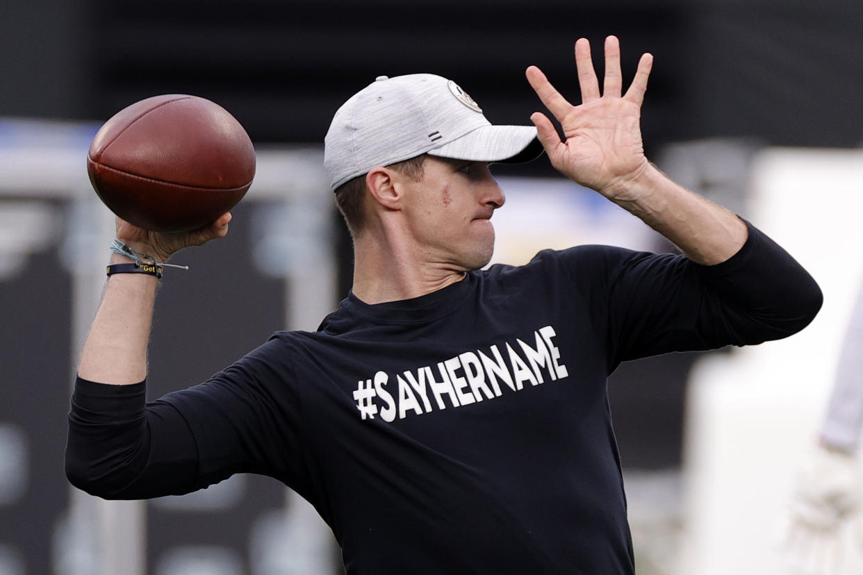 Drew Brees, seen here wearing the same "#SAYHERNAME" T-Shirt before a Jan. 3 game against the Carolina Panthers. (Jared C. Tilton/Getty Images)