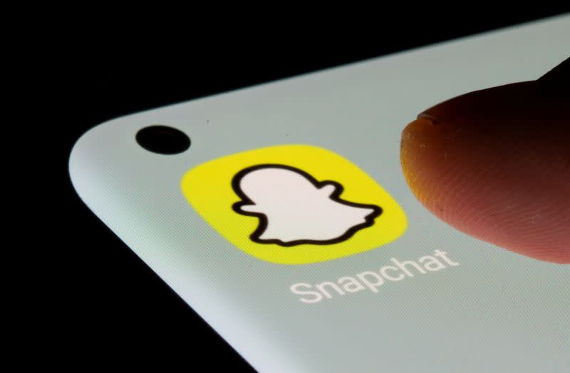 FILE PHOTO: Snapchat app is seen on a smartphone in this illustration