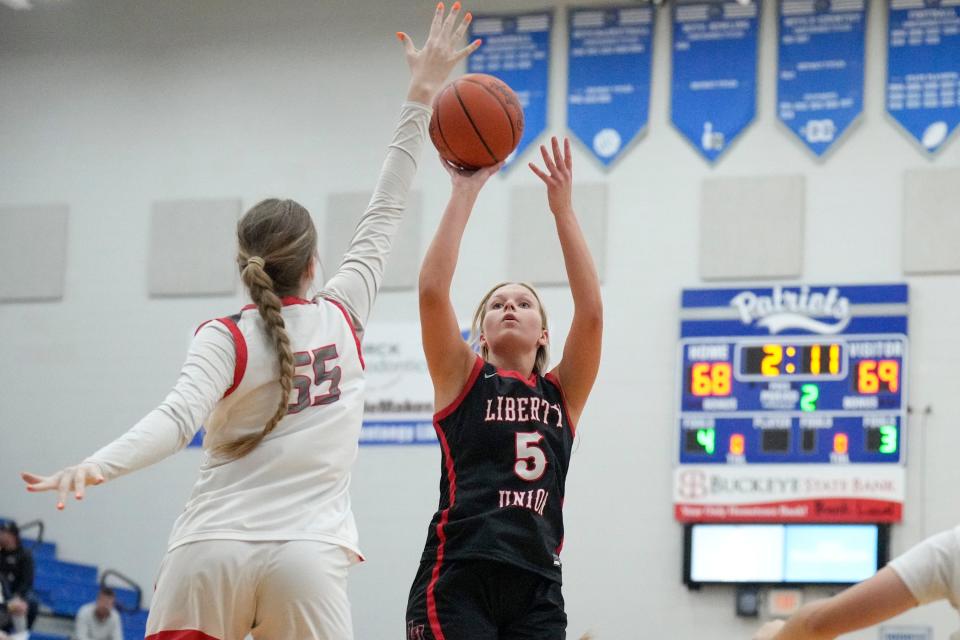 Liberty Union's Abbie Riddle makes the game-winning shot for the South girls team Friday night.