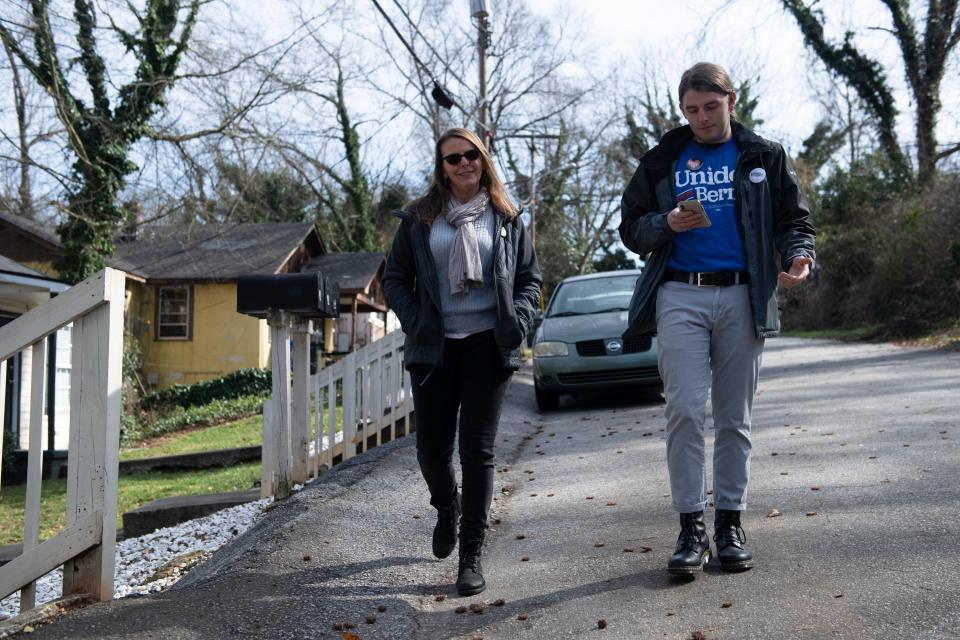 Annie McFall and her son Scott canvass in Greenville, S.C., on behalf of Bernie Sanders on Feb. 15.