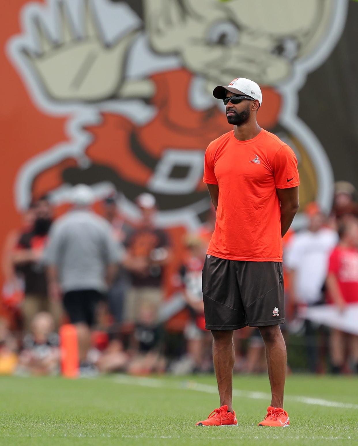 Browns GM Andrew Berry watches from the sideline during the 2022 training camp in Berea.