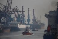 A tug boat is seen in Tanjung Priok Port in North Jakarta, Indonesia May 26, 2017. REUTERS/Darren Whiteside