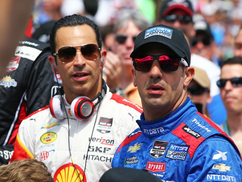 May 24, 2015; Indianapolis, IN, USA; IndyCar Series driver Tony Kanaan (right) and Helio Castroneves during the 2015 Indianapolis 500 at Indianapolis Motor Speedway. Mandatory Credit: Mark J. Rebilas-USA TODAY Sports