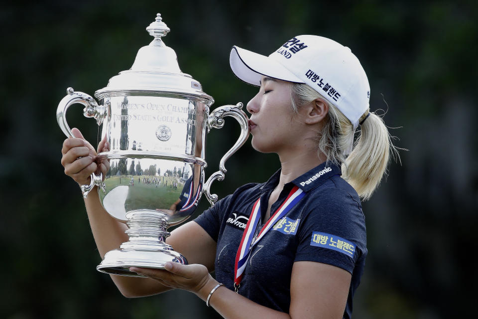 Jeongeun Lee6 of South Korea, kisses the championship trophy after winning the final round of the U.S. Women's Open golf tournament, Sunday, June 2, 2019, in Charleston, S.C. (AP Photo/Mic Smith)