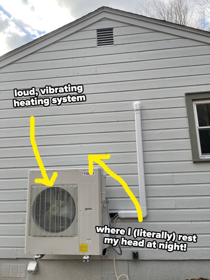 arrow pointing to heat pump on side of house and another arrow pointing to the fact that that's where the author literally rests his head at night