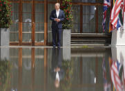 German Chancellor Olaf Scholz waits for leaders during the official welcome ceremony of G7 leaders and Outreach guests at Castle Elmau in Kruen, near Garmisch-Partenkirchen, Germany, on Monday, June 27, 2022. The Group of Seven leading economic powers are meeting in Germany for their annual gathering Sunday through Tuesday. (AP Photo/Markus Schreiber)