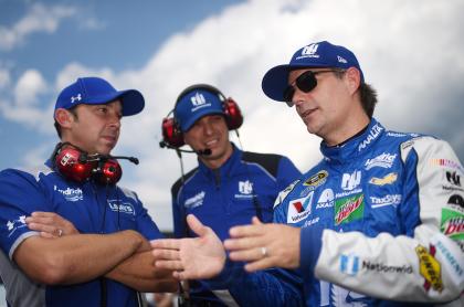 LONG POND, PA - JULY 29: (L-R) Crew chief Chad Knaus, crew chief Greg Ives and Jeff Gordon, driver of the #88 Nationwide Chevrolet, talk on the grid during qualifying for the NASCAR Sprint Cup Series Pennsylvania 400 at Pocono Raceway on July 29, 2016 in Long Pond, Pennsylvania. (Photo by Rainier Ehrhardt/NASCAR via Getty Images)