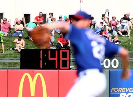 Detailed view of the pace of play digital pitch clock in the outfield between innings of the game between the Texas Rangers against the San Francisco Giants during a spring training baseball game at Surprise Stadium in Surprise, Arizona, in this March 6, 2015, file photo. Mandatory Credit: Mark J. Rebilas-USA TODAY Sports