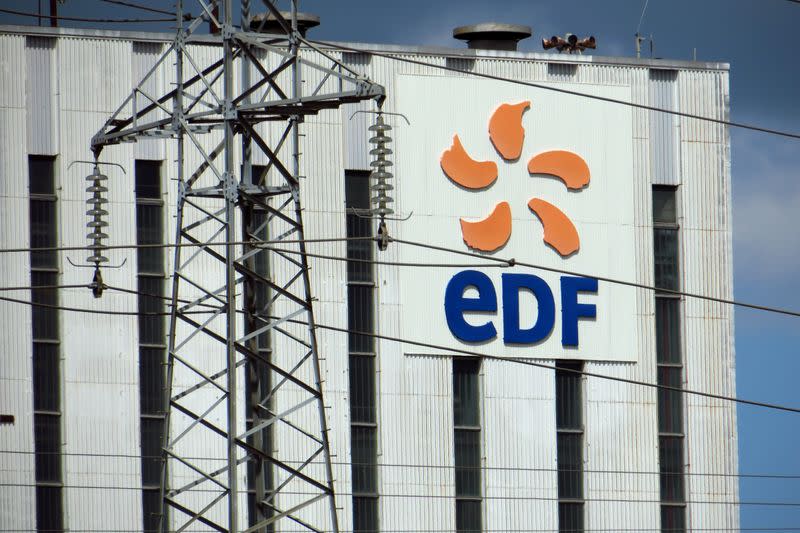 FILE PHOTO: Electrical power pylons of high-tension electricity power lines are seen next to the EDF power plant in Bouchain