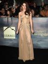 <p>Kristen Stewart wears a nude corseted Zuhair Murad Autumn Winter 12 gown with chiffon panneling, and a gold Cartier bracelet, at the LA premier of Twilight Breaking Dawn Part 2.</p>