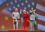 In this June 5, 2012 handout photo provided by the San Francisco Opera, Chen-Ye Yuan, as Chou En-lai, from left, Maria Kanyova, as Pat Nixon, and Brian Mulligan, as Richard Nixon, are shown during a scene from the final dress rehearsal of Nixon in China. The production, increasingly recognized as a modern masterpiece, is finally getting the recognition it deserves on the home ground of composer John Adams, in a sparkling production that highlights the San Francisco Opera's summer season. (AP Photo/San Francisco Opera, Cory Weaver, handout)