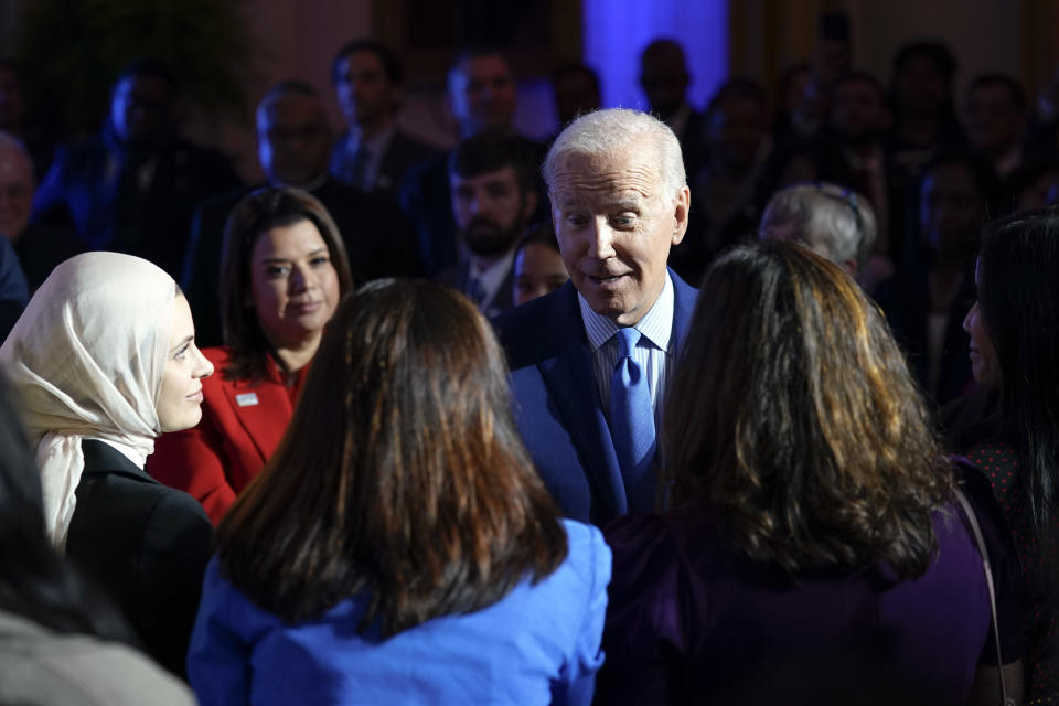 FILE - President Joe Biden talks to people after speaking during the United We Stand Summit in the East Room of the White House in Washington, Sept. 15, 2022. (AP Photo/Susan Walsh, File)