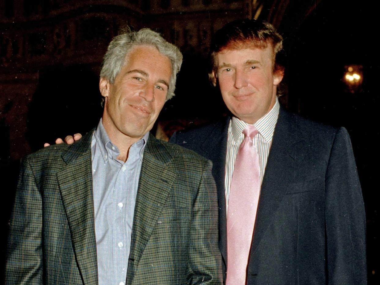 Jeffrey Epstein standing next to Donald Trump in 1997