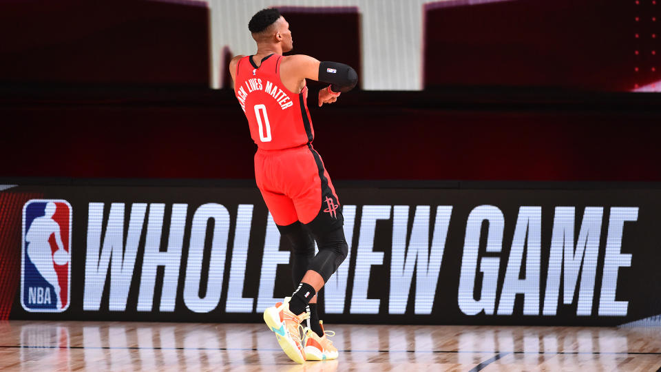 Orlando, FL - AUGUST 2: Russell Westbrook #0 of the Houston Rockets looks on prior to a game against the Milwaukee Bucks on August 2, 2020 at The Arena at ESPN Wide World Of Sports Complex in Orlando, Florida. NOTE TO USER: User expressly acknowledges and agrees that, by downloading and/or using this Photograph, user is consenting to the terms and conditions of the Getty Images License Agreement. Mandatory Copyright Notice: Copyright 2020 NBAE (Photo by Jesse D. Garrabrant/NBAE via Getty Images)