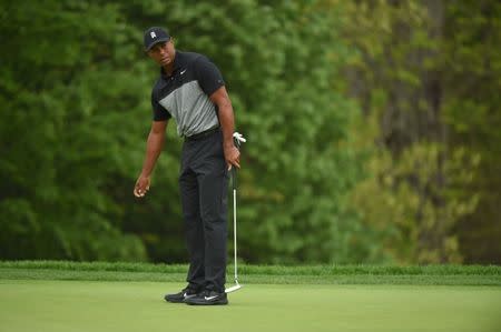 May 17, 2019; Bethpage, NY, USA; Tiger Woods reacts to his putt on the 14th hole during the second round of the PGA Championship golf tournament at Bethpage State Park - Black Course. Mandatory Credit: John David Mercer-USA TODAY Sports