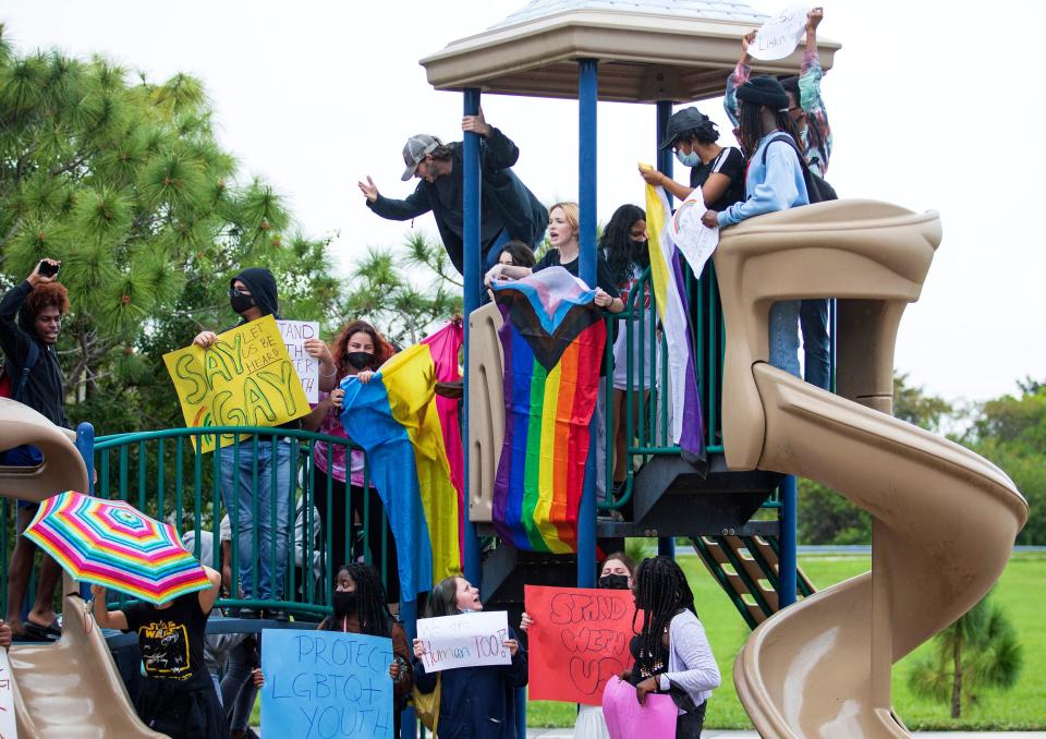 Students from Atlantic High School in Delray Beach rally at Eagle Park after walking out of school to protest the so-called "Don't Say Gay" bill.