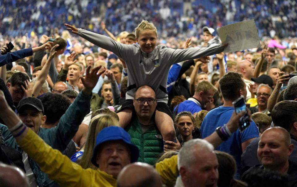 Sheffield Wednesday' fans celebrate on the pitch after the Sky Bet League One play-off semi-final second leg match at Hillsborough, Sheffiel - Nick Potts/PA Wire