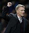 Manchester United's manager David Moyes reacts after their Champions League soccer match against Shakhtar Donetsk at Old Trafford in Manchester, northern England December 10, 2013. REUTERS/Phil Noble