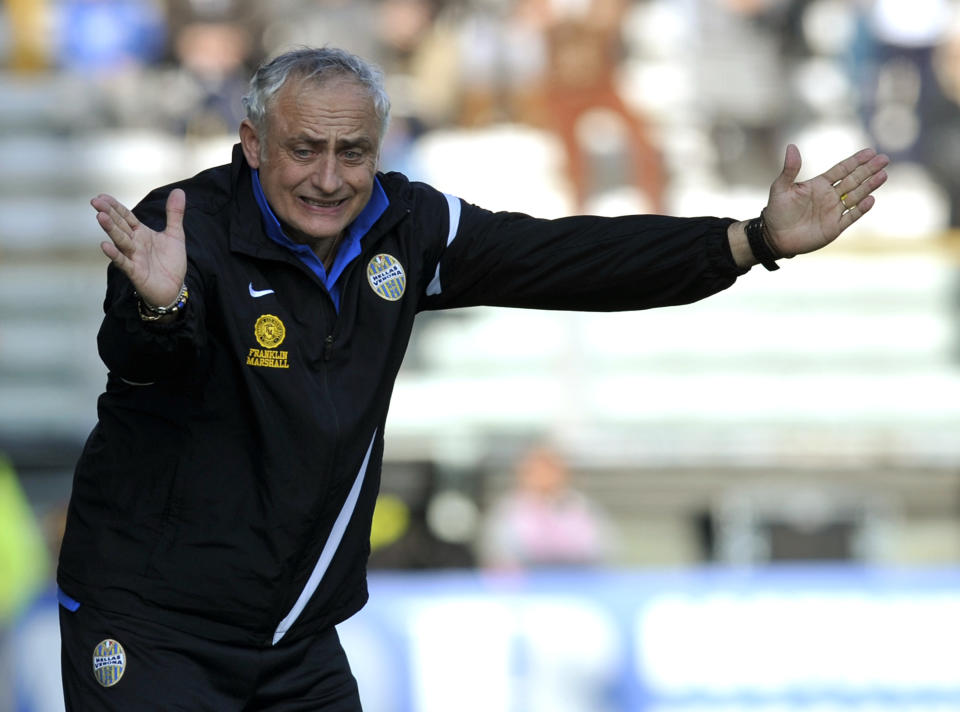 Verona coach Andrea Mandorlini gestures during a serie A soccer match between Parma and Verona at Parma's Tardini stadium, Italy, Sunday, March 9, 2014. (AP Photo/Marco Vasini)