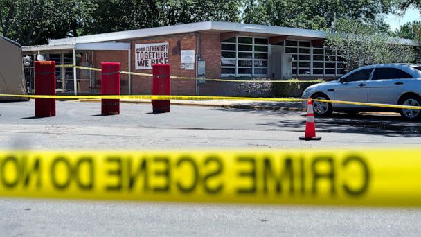 PHOTO: In this May 25, 2022, file photo, crime scene tape surrounds Robb Elementary School after a mass shooting in Uvalde, Texas. (Jae C. Hong/AP, FILE)