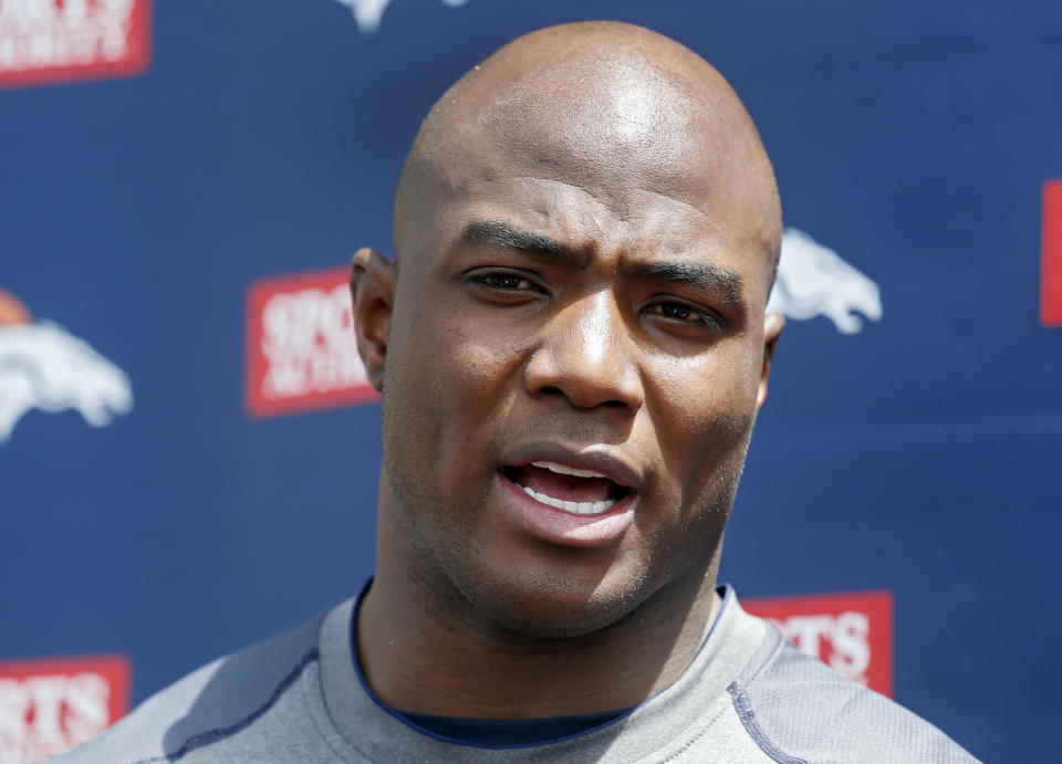 Denver Broncos defensive end DeMarcus Ware talks to the media after working out at the NFL football teams training facility in Englewood, Colo., on Monday, April 21, 2014. (AP Photo/Ed Andrieski)