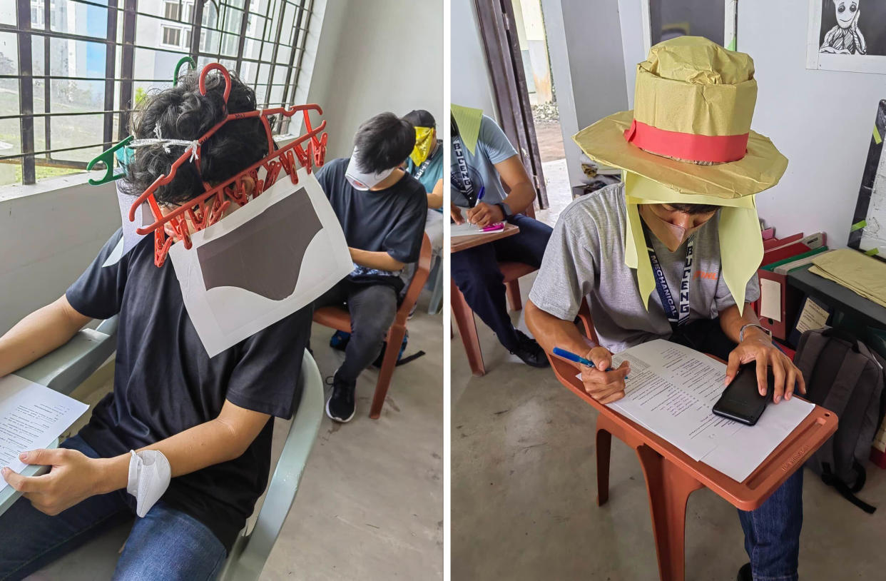 Students at Bicol University College of Engineering in Legazpi City, the Philippines, take an exam on Oct. 17, 2022, while wearing 'anti-cheating hats' they designed as part of an assignment (Mary Joy Mandane-Ortiz)