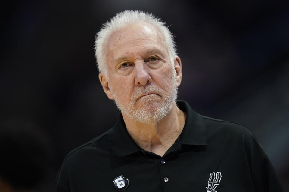 San Antonio Spurs head coach Gregg Popovich looks on during the first half of an NBA preseason basketball game against the Utah Jazz, Tuesday, Oct. 11, 2022, in Salt Lake City. (AP Photo/Rick Bowmer)