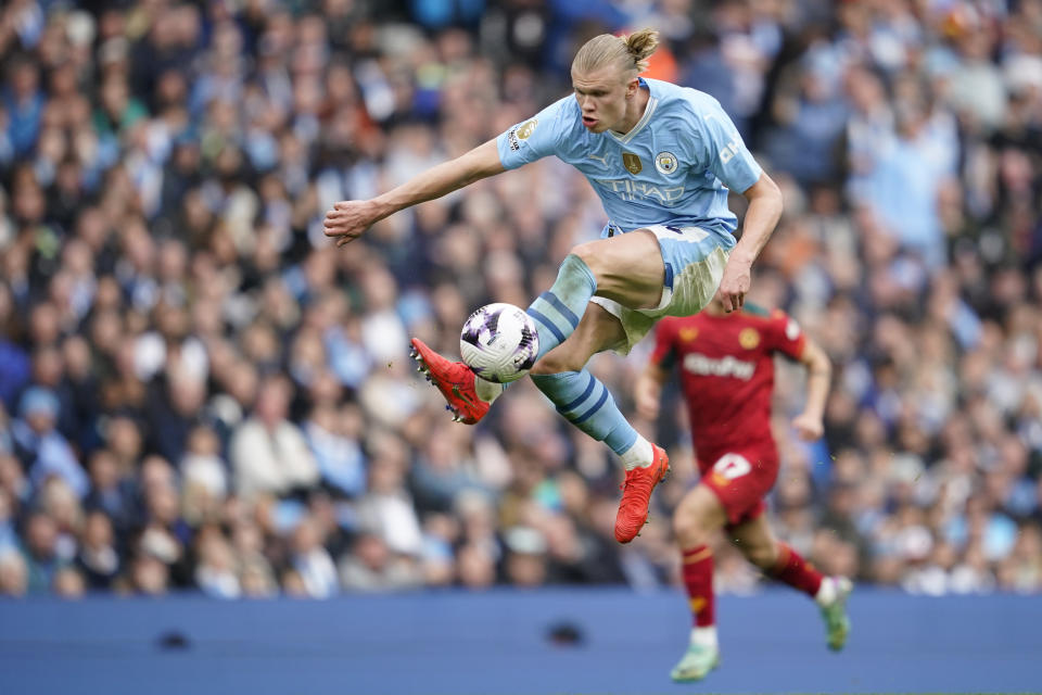 Manchester City's Erling Haaland is in action during the English Premier League soccer match between Manchester City and Wolverhampton Wanderers at the Etihad Stadium in Manchester, England, Saturday, May 4, 2024. (AP Photo/Dave Thompson)