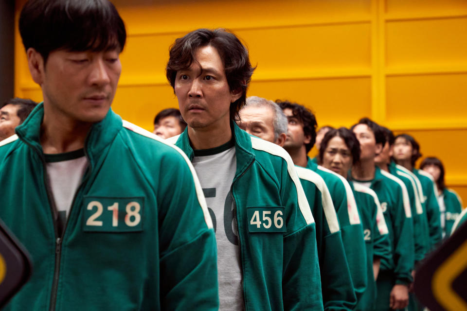 Lee Jung-jae (centre) stars in Squid Game (Netflix/Youngkyu Park/PA)