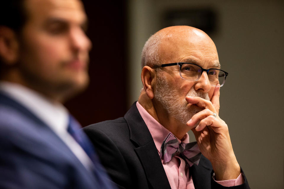 Commissioner Roger Bergman listens to public comment Tuesday, Jan. 24, in West Olive.