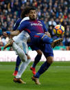 <p>Soccer Football – La Liga Santander – Real Madrid vs FC Barcelona – Santiago Bernabeu, Madrid, Spain – December 23, 2017 Barcelona’s Luis Suarez in action with Real Madrid’s Marcelo REUTERS/Juan Medina </p>