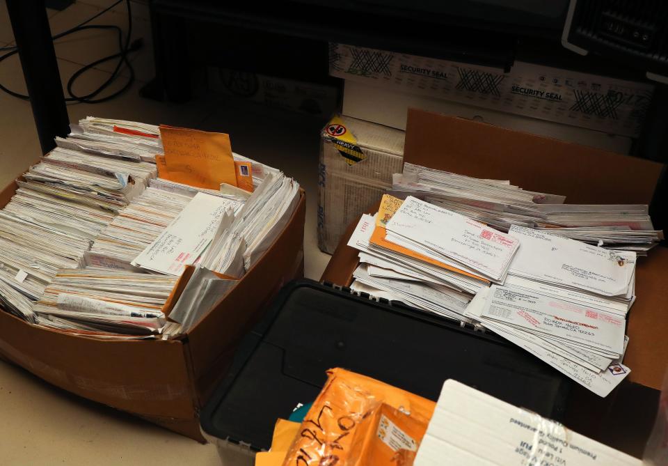 Boxes of letters from listeners sit the Palm Springs studio of "The Art Laboe Connection."