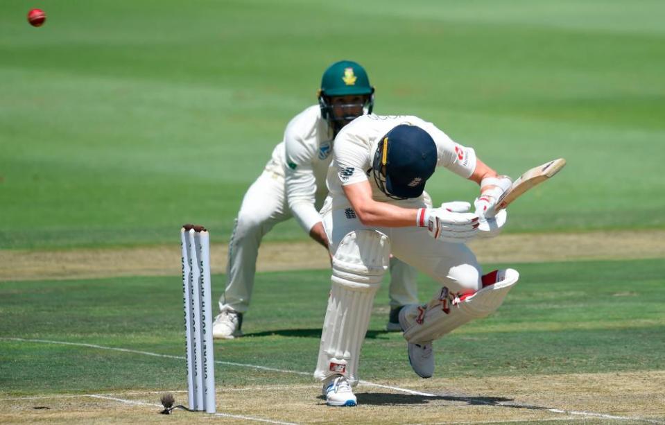 Mark Wood ducks under a bouncer during a defiant late stand with the bat.