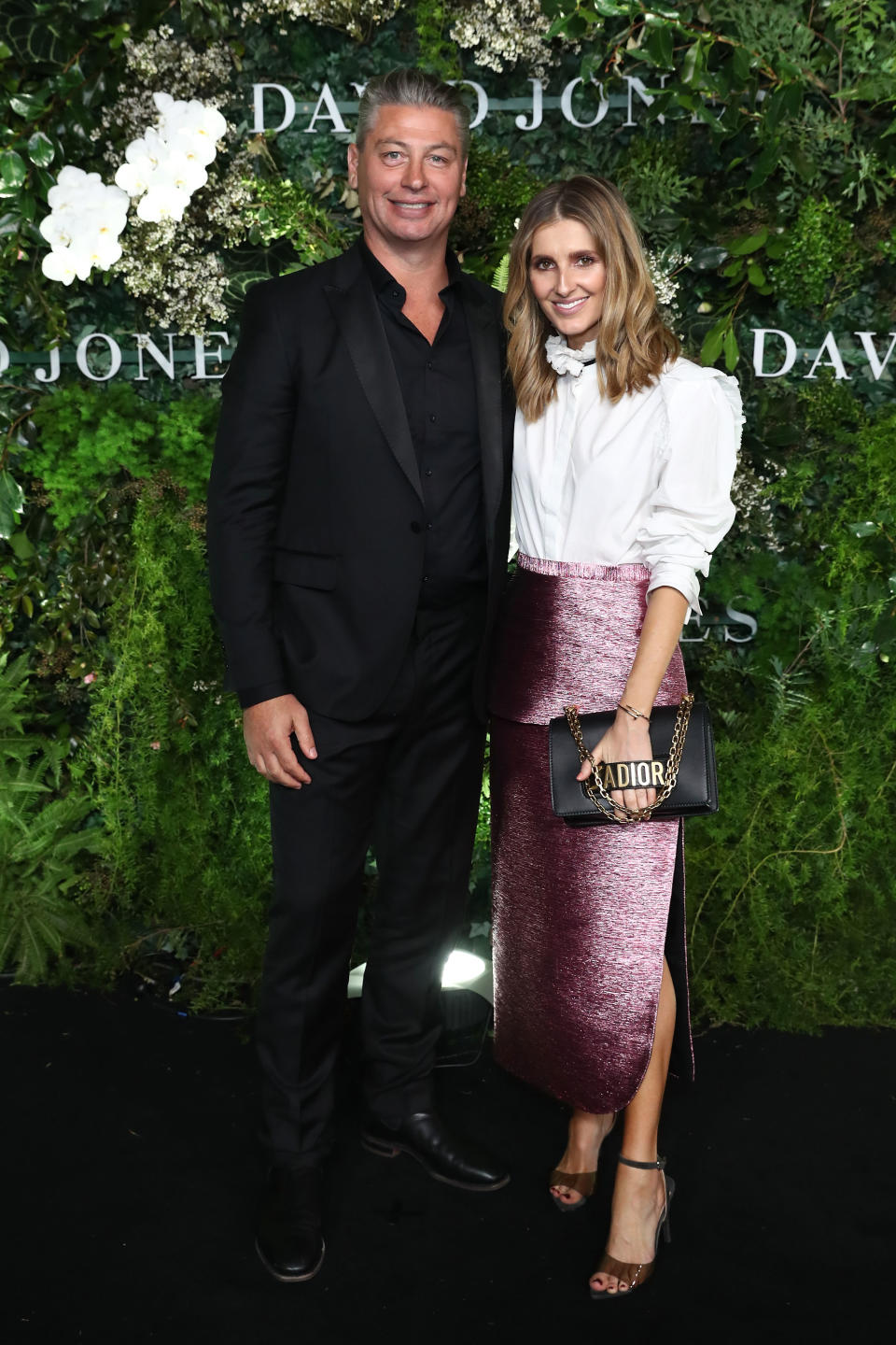 <p>Luke Ricketson and Kate Waterhouse smiled for the photographers against the pretty, green, David Jones backdrop. Photo: Getty Images </p>