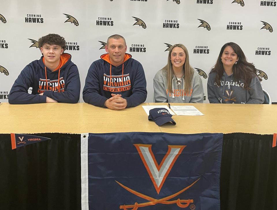 Corning-Painted Post senior Jenna DiNardo during a celebration March 15, 2023 to celebrate her signing to play lacrosse at the University of Virginia. Also pictured, from left, are her brother, Domenic (Buddy); and her parents Domenic and Emmie DiNardo.