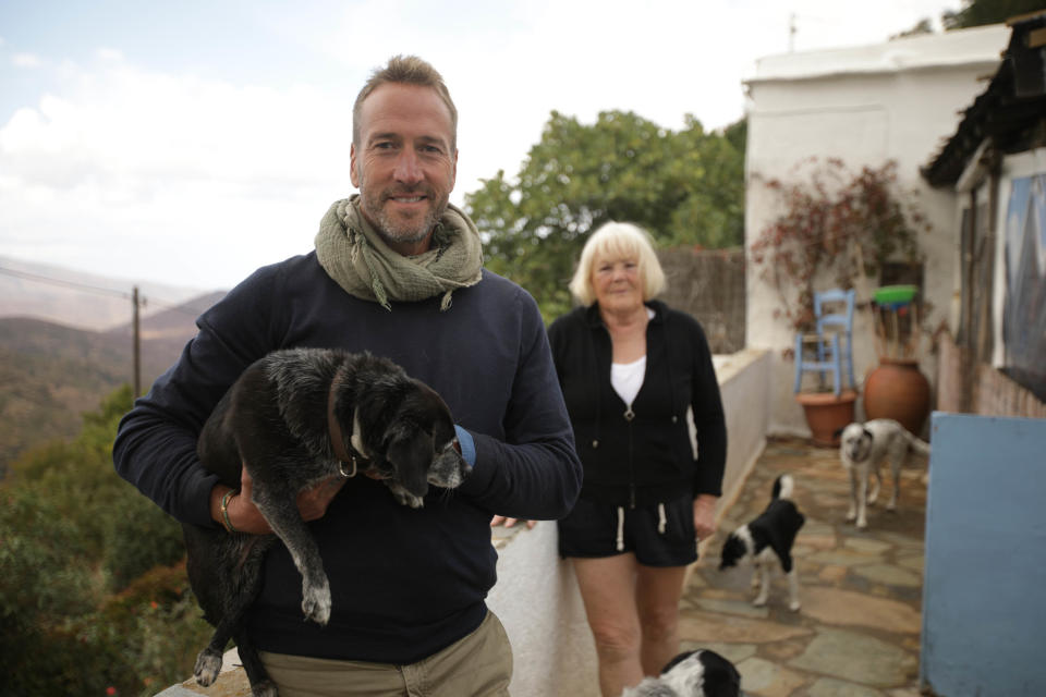 Contributor Sandy with Presenter Ben Fogle sat outside the contributor&#39;s property in Greece