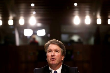 FILE PHOTO: U.S. Supreme Court nominee judge Brett Kavanaugh speaks during a Senate Judiciary Committee confirmation hearing on Capitol Hill in Washington, U.S., September 4, 2018. REUTERS/Joshua Roberts/File Photo