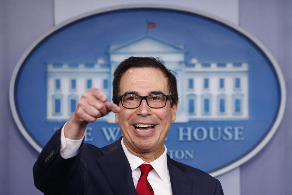 Treasury Secretary Steve Mnuchin takes questions as he speaks during a news briefing at the White House, in Washington, Monday, July 15, 2019. (AP Photo/Carolyn Kaster)