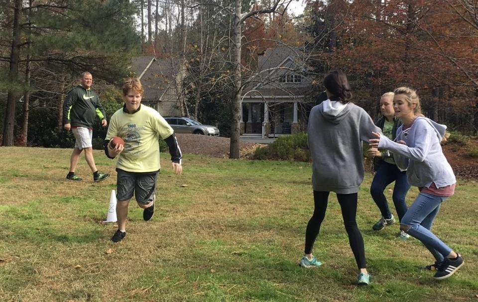 The Busbee family football game. 