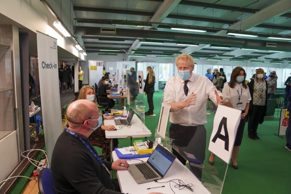 Prime Minister Boris Johnson during a visit to a vaccination hub in the Guttman Centre at Stoke Mandeville Stadium in Aylesbury, Buckinghamshire, as the booster vaccination programme continues. Picture date: Monday January 3, 2022. (PA Wire)