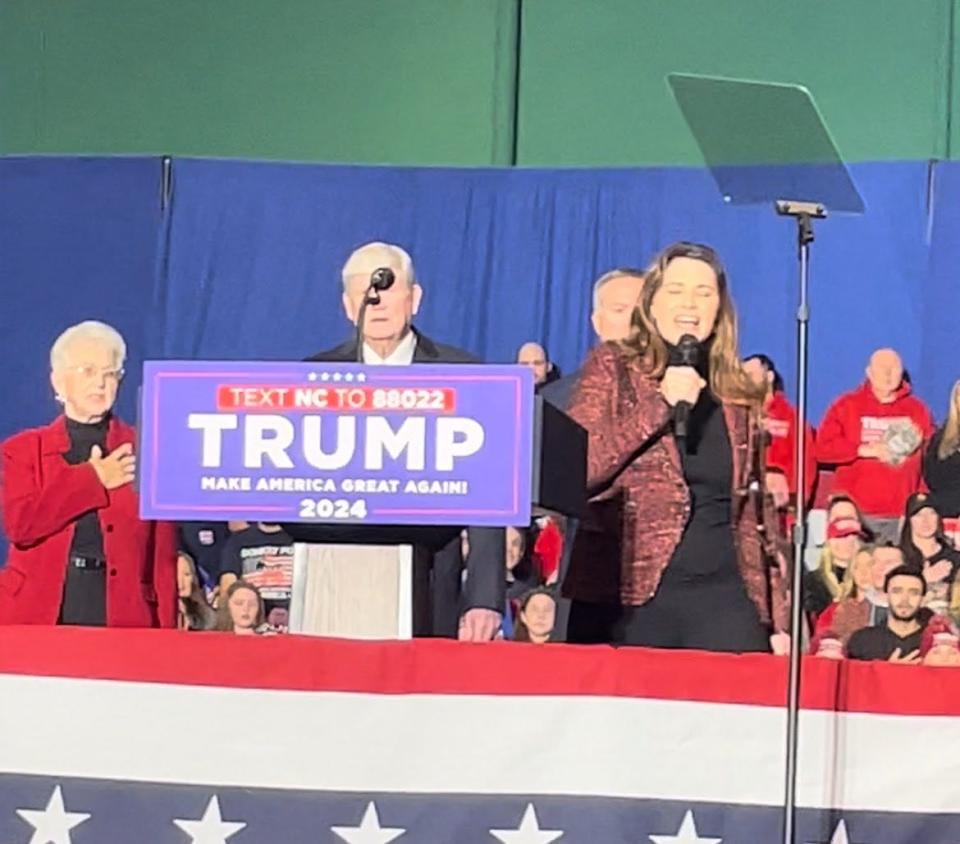 Sarah Janisse Brown, of Greenwood, Indiana, sings the U.S. national anthem during a March 2, 2024, campaign rally in Greensboro, North Carolina, for U.S. presidential candidate Donald Trump.